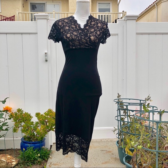 Nicole Miller Dresses & Skirts - Nicole Miller Black V Neck Dress w/Lace Detail.
